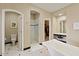 Bathroom features a modern tub, separate shower, and vanity area at 42 S Nevada Way, Gilbert, AZ 85233