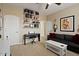 Music room includes musical instruments, a sofa, and ample storage at 42 S Nevada Way, Gilbert, AZ 85233
