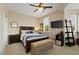 Bedroom featuring a king bed, dresser and TV at 42 S Nevada Way, Gilbert, AZ 85233