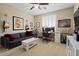 Versatile bedroom setup as a music room, bathed in natural light from the large window at 42 S Nevada Way, Gilbert, AZ 85233