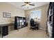 Bedroom with large desk and shelving, perfect for a home office or study space at 42 S Nevada Way, Gilbert, AZ 85233