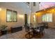 Inviting outdoor dining area in a private courtyard with ambient string lighting at 42 S Nevada Way, Gilbert, AZ 85233