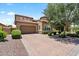 Charming two-story home with a two-car garage, landscaped front yard, and inviting curb appeal at 42 S Nevada Way, Gilbert, AZ 85233