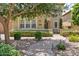 Inviting home exterior with lush landscaping and a charming walkway at 42 S Nevada Way, Gilbert, AZ 85233