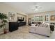 Inviting living room with plenty of natural light, comfortable sofa, and stylish decor at 42 S Nevada Way, Gilbert, AZ 85233