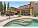 Inviting backyard with a refreshing pool, covered patio, and ample lounging space at 42 S Nevada Way, Gilbert, AZ 85233