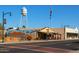 Charming street view featuring a mural, vintage buildings, and a water tower under a clear, sunny sky at 42 S Nevada Way, Gilbert, AZ 85233
