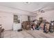 Spacious garage with tile flooring, ample storage, and natural light at 421 S 113Th Way, Mesa, AZ 85208