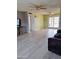 Bright living room with sliding glass doors and recessed lighting at 421 S 113Th Way, Mesa, AZ 85208