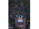 Aerial view of a home with a sparkling pool, spa, patio, and beautiful desert landscape at 42429 N Cross Timbers Ct, Anthem, AZ 85086