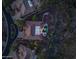 Aerial view of home with desert landscaping, outdoor lighting, pool and spa at 42429 N Cross Timbers Ct, Anthem, AZ 85086