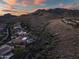 Panoramic aerial shot showcasing a luxury home community nestled amidst the desert landscape and mountains at 42429 N Cross Timbers Ct, Anthem, AZ 85086