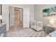 Bright bedroom showcasing a crib and charming decor, creating a welcoming atmosphere at 42429 N Cross Timbers Ct, Anthem, AZ 85086