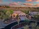 Beautiful desert home with a three car garage, desert landscaping and a view of the community at 42429 N Cross Timbers Ct, Anthem, AZ 85086
