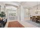 Expansive foyer with decorative arches, tiled floors, and a view into adjacent living spaces at 42429 N Cross Timbers Ct, Anthem, AZ 85086