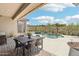 Inviting outdoor patio area with desert views, perfect for dining and relaxation at 42429 N Cross Timbers Ct, Anthem, AZ 85086