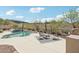 Relaxing pool area with desert landscape, seating and great views at 42429 N Cross Timbers Ct, Anthem, AZ 85086