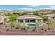Beautiful single-story home boasts a private pool, mature landscaping, and mountain views at 42429 N Cross Timbers Ct, Anthem, AZ 85086