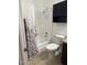 Bathroom featuring a shower-tub combo, decorative shower curtain and storage cabinet at 520 N Stapley Dr # 265, Mesa, AZ 85203
