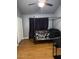 Spacious bedroom with a canopy bed, ceiling fan, and ample closet space at 520 N Stapley Dr # 265, Mesa, AZ 85203