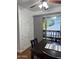 Charming dining area with a dark table and chairs, plus storage cabinets at 520 N Stapley Dr # 265, Mesa, AZ 85203