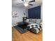 Comfortable living room with gray sofa, coffee table, and ceiling fan at 520 N Stapley Dr # 265, Mesa, AZ 85203