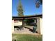 Shaded community picnic area with a picnic table and a nearby trash can at 520 N Stapley Dr # 265, Mesa, AZ 85203