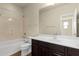 Full bathroom with bathtub and shower combination, single vanity, and chrome fixtures at 5223 W Bent Tree Dr, Phoenix, AZ 85083