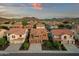 Inviting two-story home features desert landscaping, a two-car garage, and a charming facade, offering suburban appeal at 5223 W Bent Tree Dr, Phoenix, AZ 85083