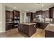 Well-appointed kitchen with stainless steel appliances, granite countertops, and ample cabinet space at 5223 W Bent Tree Dr, Phoenix, AZ 85083