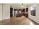 Spacious kitchen boasts dark wood cabinetry, stainless steel appliances, and granite countertops at 5223 W Bent Tree Dr, Phoenix, AZ 85083