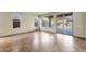 Bright living room with tile flooring, large sliding doors and views of the backyard pool at 5223 W Bent Tree Dr, Phoenix, AZ 85083