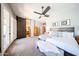 Generously sized primary bedroom features an en suite bathroom and large closet at 5416 W Village Dr, Glendale, AZ 85308