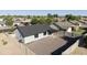 This home's backyard has a neutral rock surface and a covered patio area for outdoor enjoyment at 5602 N 73Rd Ave, Glendale, AZ 85303