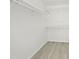 Walk-in closet with shelving for optimal storage and organization at 5602 N 73Rd Ave, Glendale, AZ 85303