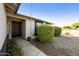Single-story home with well-maintained landscaping, security door and mature trees at 5602 N 73Rd Ave, Glendale, AZ 85303