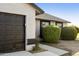 Well-maintained single-story home with a two-car garage, and desert landscaping at 5602 N 73Rd Ave, Glendale, AZ 85303
