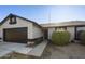 Charming single-story home with a two-car garage and manicured front yard landscaping at 5602 N 73Rd Ave, Glendale, AZ 85303