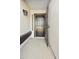 Inviting front entryway featuring a secure door and modern lighting at 5602 N 73Rd Ave, Glendale, AZ 85303