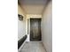 Close up of Front door with security screen and sidelight window at 5602 N 73Rd Ave, Glendale, AZ 85303