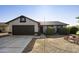 Charming home with a two-car garage and landscaped front yard at 5602 N 73Rd Ave, Glendale, AZ 85303