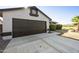 Attached two-car garage with a concrete driveway in a well-maintained community at 5602 N 73Rd Ave, Glendale, AZ 85303