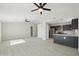 Spacious living area showcasing an open floor plan connecting the living room and modern kitchen at 5602 N 73Rd Ave, Glendale, AZ 85303