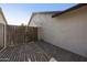 Side yard features a wooden access gate and is covered with gravel at 5602 N 73Rd Ave, Glendale, AZ 85303