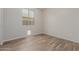 Guest bedroom offers wood-look floors and great natural light at 5659 N 195Th Dr, Litchfield Park, AZ 85340