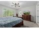 Main bedroom boasts lots of natural light and neutral toned carpet at 5659 N 195Th Dr, Litchfield Park, AZ 85340