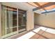 Spacious covered patio with sliding glass doors and convenient access to indoor living spaces at 620 S Allred Dr, Tempe, AZ 85288