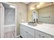 Modern bathroom featuring a stylish vanity with a stone vessel sink and decorative mirror at 620 S Allred Dr, Tempe, AZ 85288