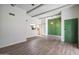 Bright living room with modern flooring, open layout, and views into the kitchen at 620 S Allred Dr, Tempe, AZ 85288