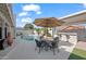 Backyard featuring a pool, patio with dining table, and built-in barbecue area for outdoor entertainment at 6715 S Lakeshore Dr, Tempe, AZ 85283